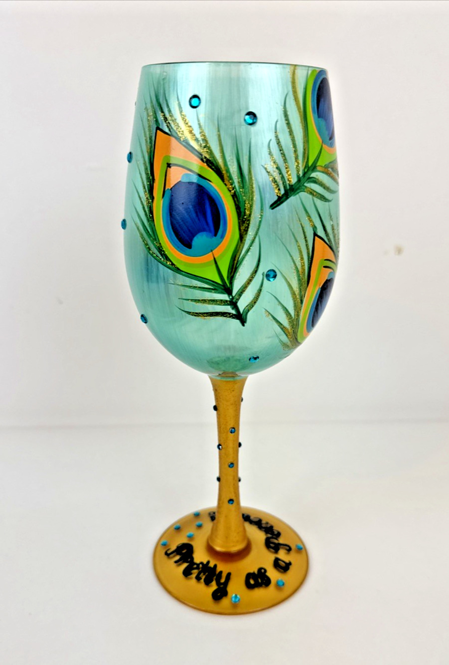 Lolita "Pretty as a Peacock" hand-painted artisan wine glass.